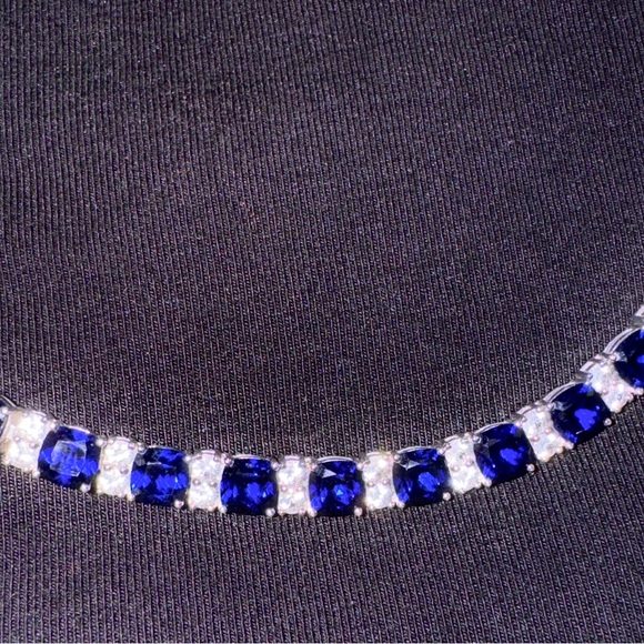 White gold bracelet with white diamond stones.